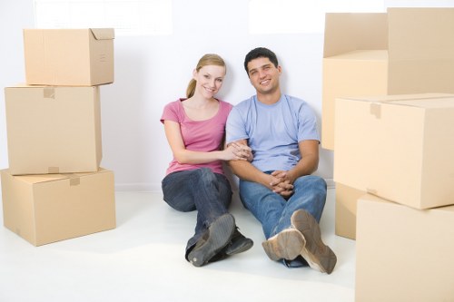 Local removal van service handling boxes and furniture in Kennington