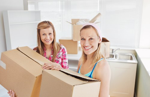 Local moving team handling household items for a Kennington customer