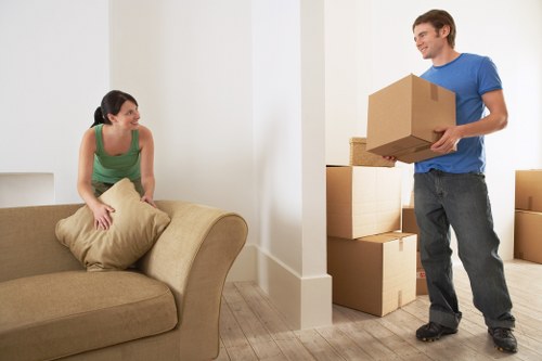 Packed boxes and furniture ready for a flat removal in Kennington