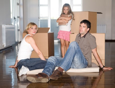 Careful room-by-room packing in a Kennington flat with labelled cartons